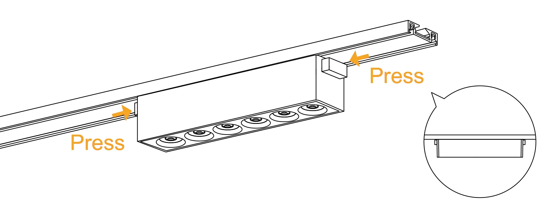 The same luminaire in the track with the catches at both ends being pressed in to lock it
