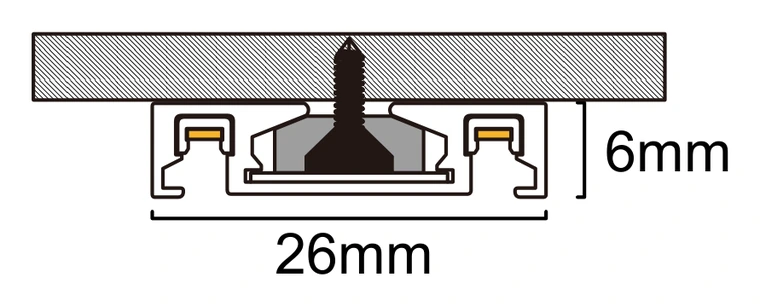 Cross-section of the 26mm wide, 6mm deep track channel fixed to a ceiling, showing the positioning plug and screw in the centre and the two copper strips along the inner edges