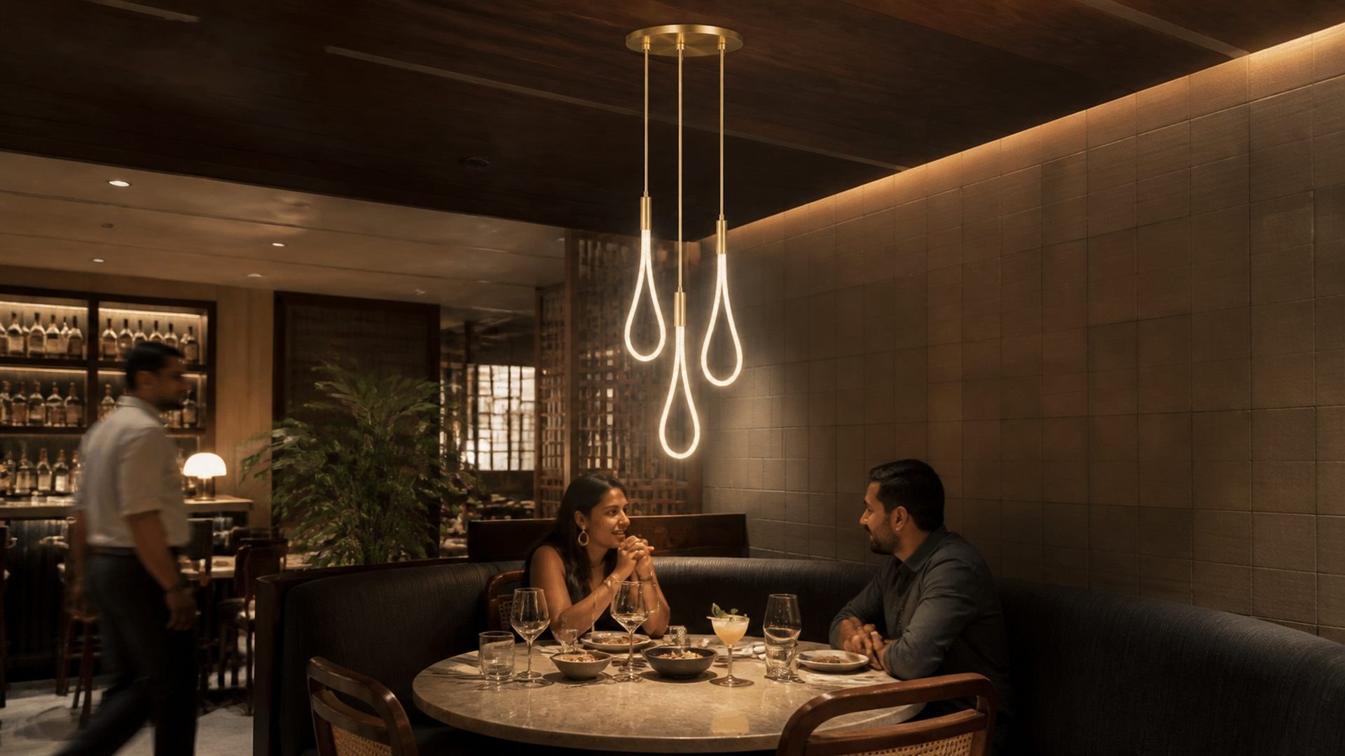 Two Habl teardrop pendants over a restaurant table